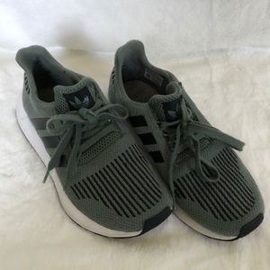 Green adidas sneakers